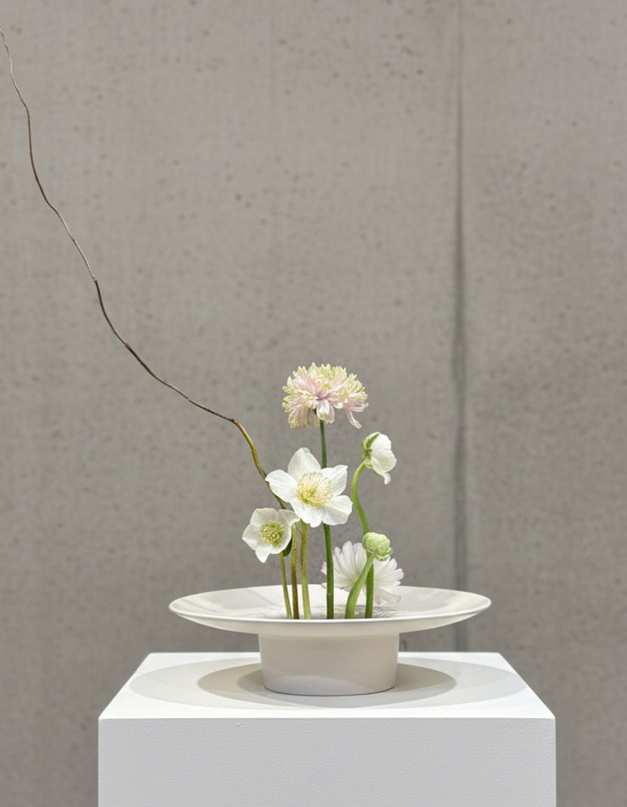 Romantic garden-style arrangement in vintage silver compote